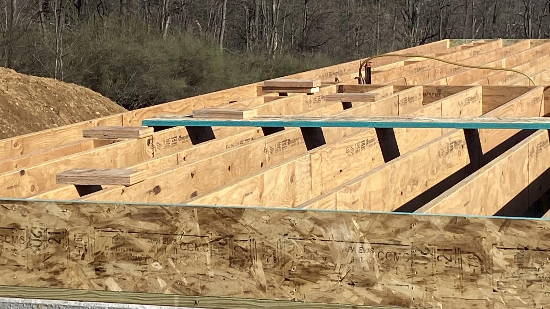 Madison Township Lumber delivery truck loaded with lumber